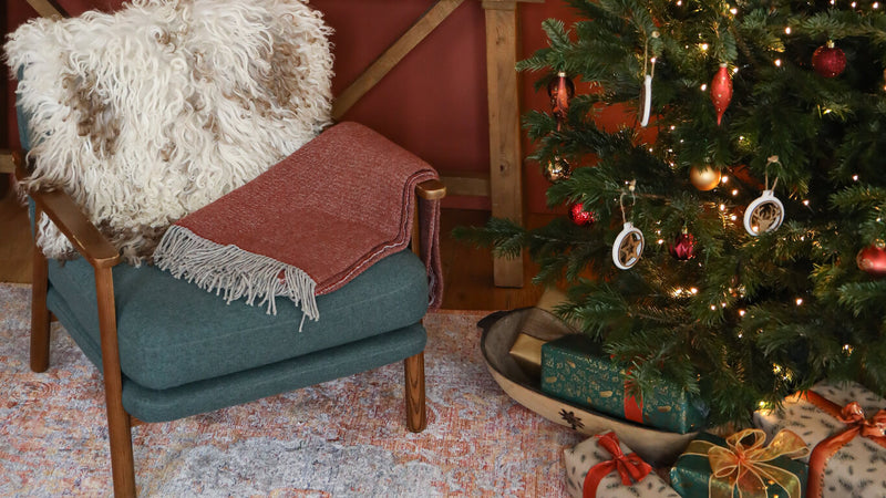 4 Christmas tree decoration ideas to match your wall colour