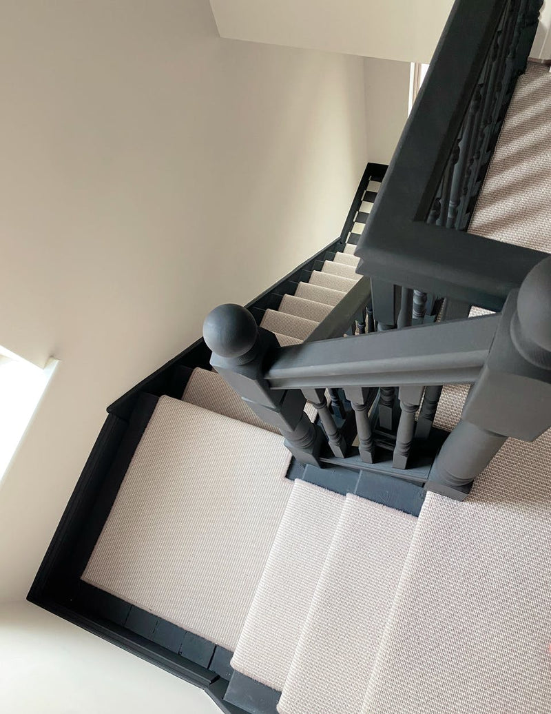 Painted black staircase using Lick Black 02