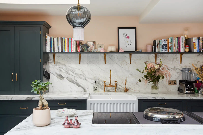 Daisy Lowe's kitchen with open shelving and walls painted in Lick Pink 02 
