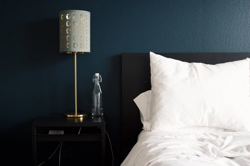 Dark bedroom via Unsplash 