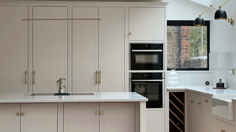 Neutral kitchen cabinets and cupboards decorated in Lick Pink 01 paint shade 