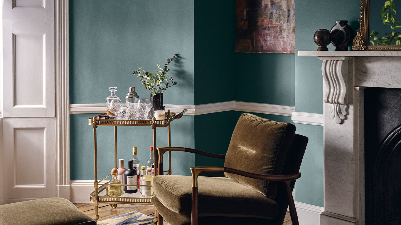 Living room painted in Lick Teal 03 76 Dean Street with Soho House and Soho Home interior styling