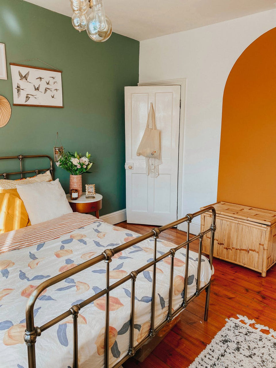 Bedroom with green and Lick paint orange 02 feature walls